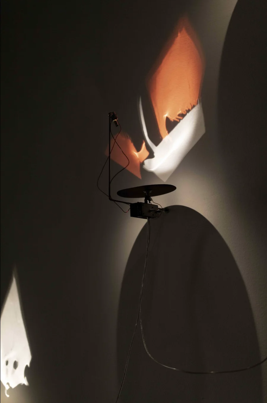 Reflexions Micra by Antoni Arola, orange and white light reflection detail