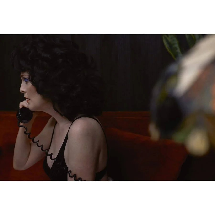 Julianne Moore on the phone, recreating a Blue Velvet scene, photographed by Luca Guadagnino